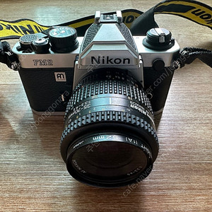 니콘 아남 fm2 필름카메라, 35-70mm 줌렌즈, 필름, 삼각대 세트로 팝니다.