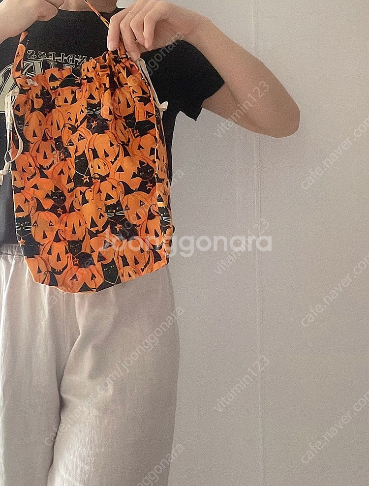 가인스토리 디자이너패브릭 손가방--0