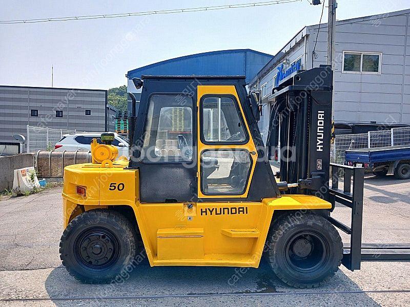 저렴한 중고지게차 현대 5톤 자동발 캐빈 덧발 디젤지게...--4