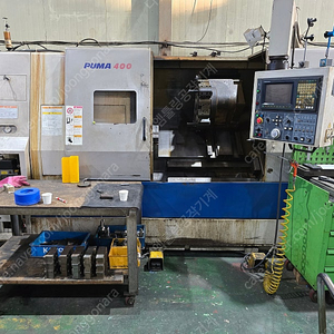 2006년식 두산 Puma400B 15인치척 저렴하게 판매합니다