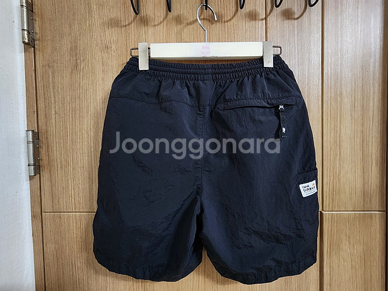(S)뉴발란스 UNI헤리티지 우븐쇼츠 반바지--1