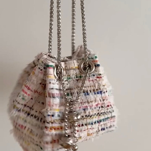 노미나떼 아크리스도 트위드 복조리백 가방