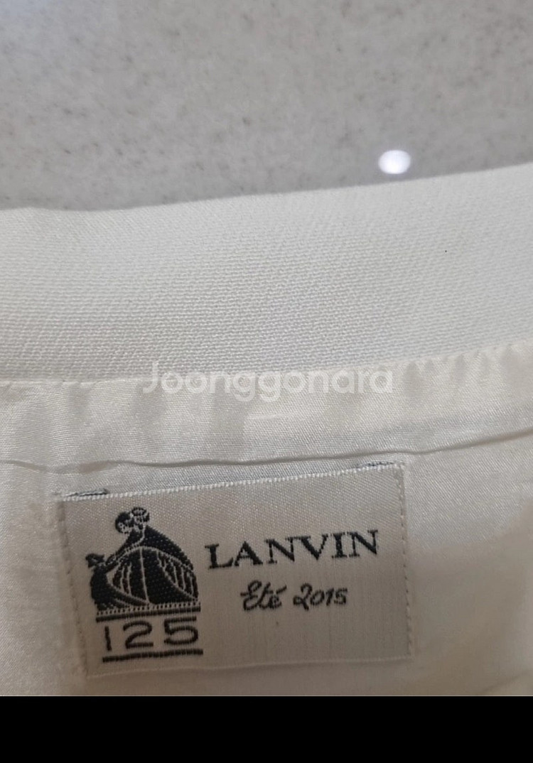 랑방(LANVIN) 진주 장식 화이트 슬리브리스 탑--3