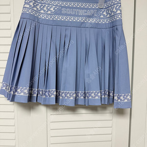 사우스케이프 플리츠 스커트