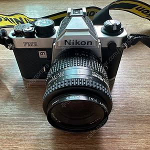 니콘 아남 fm2 필름카메라, 35-70mm 줌렌즈, 필름, 삼각대 세트로 팝니다.
