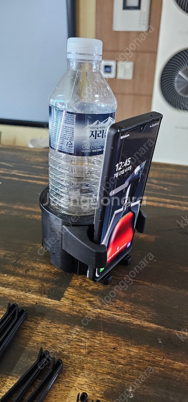 (새것) 차량 송풍구 컵홀더 핸드폰거치대 겸용--4