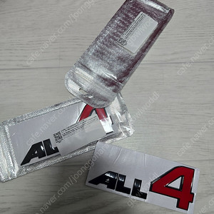 미니쿠퍼 컨트리맨 ALL 4 로고