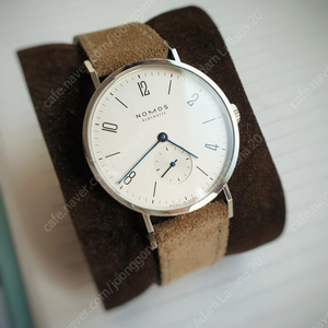 노모스 탕겐테 33mm 구매합니다.