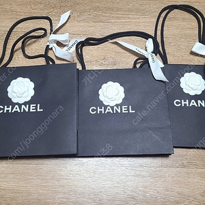 샤넬 까멜리아 쇼핑백 중사이즈 미사용 9천원