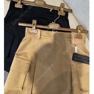 비클라 포켓미니스커트 카멜 44