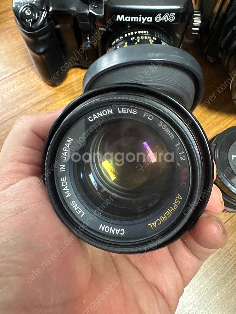 Canon 55mm f1.2 S.S.C. Aspheri...--0