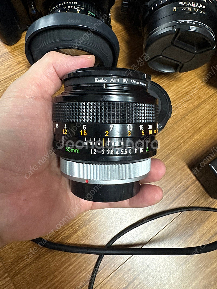 Canon 55mm f1.2 S.S.C. Aspheri...--1
