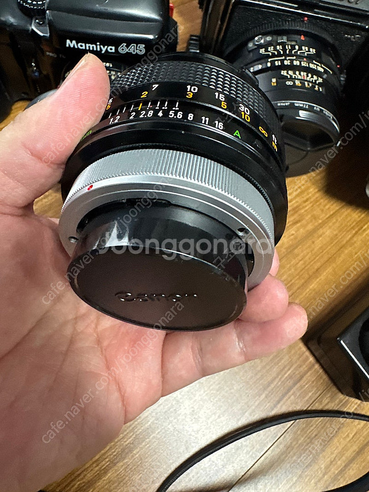 Canon 55mm f1.2 S.S.C. Aspheri...--2