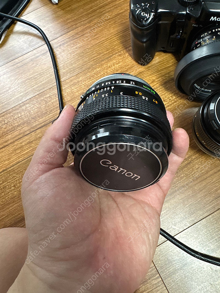 Canon 55mm f1.2 S.S.C. Aspheri...--3
