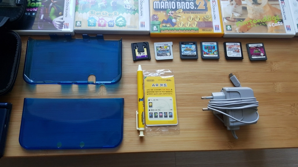 닌텐도 3DS XL + 15개의 3DS 칩 , 4개의 DS 칩 + 기타 이미지