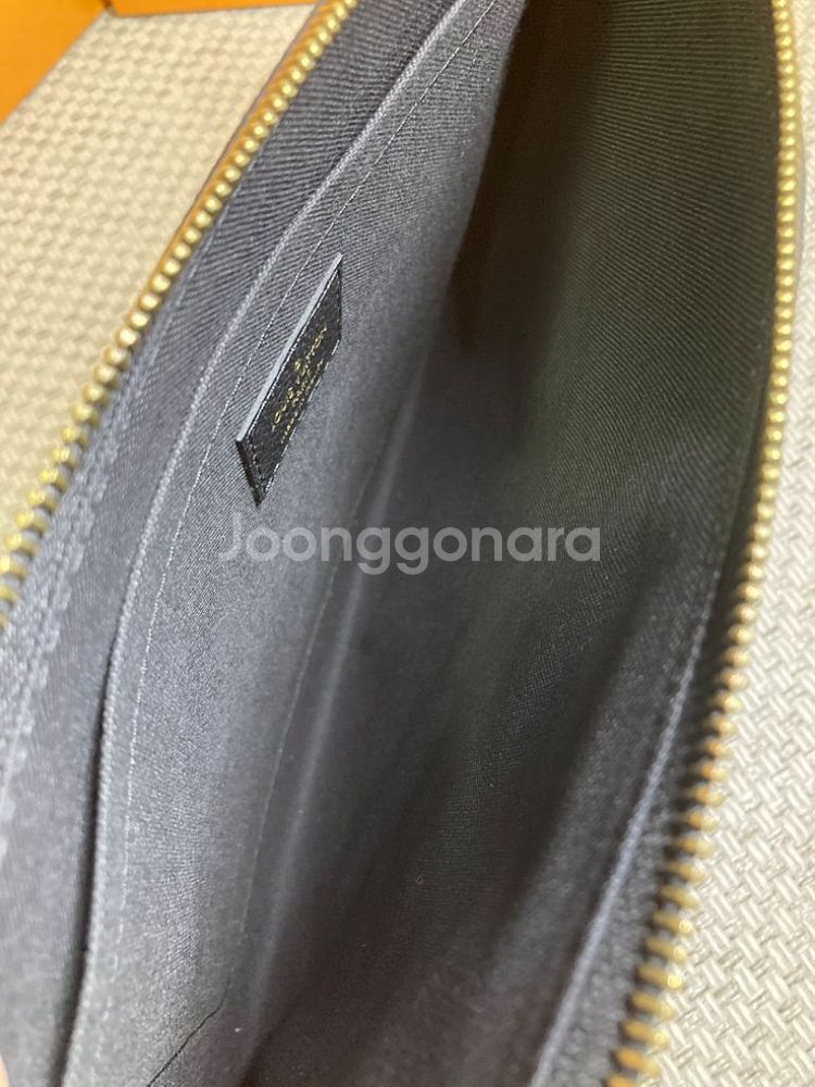 [새상품] 루이비통 앙프렝뜨 데일리 클러치 파우치--2
