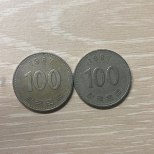 1987년 100원 동전2개(최대 가격 250,000)