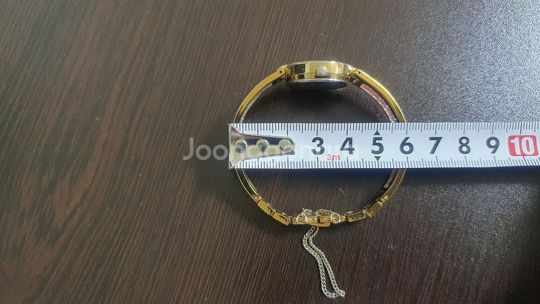 여자 핑크색 손목시계가 35년 넘은거에요~--5