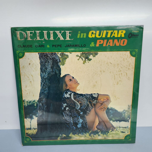 Deluxe In Guitar Piano lp