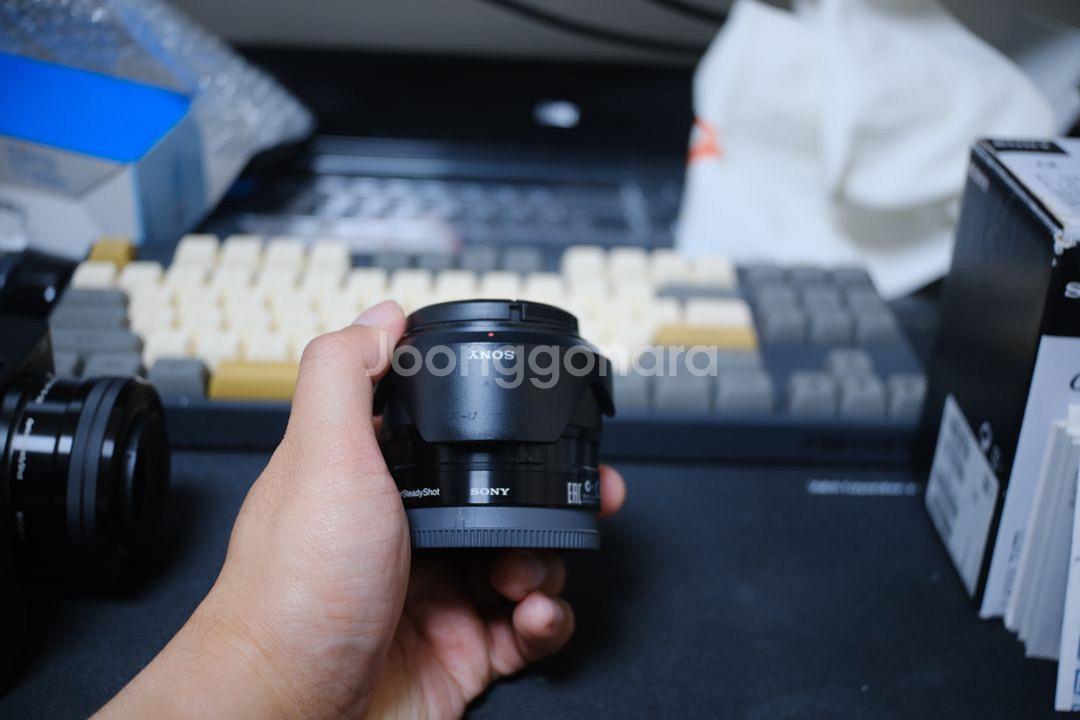 sel35f18 소니크롭단렌즈 카페렌즈 판매--2