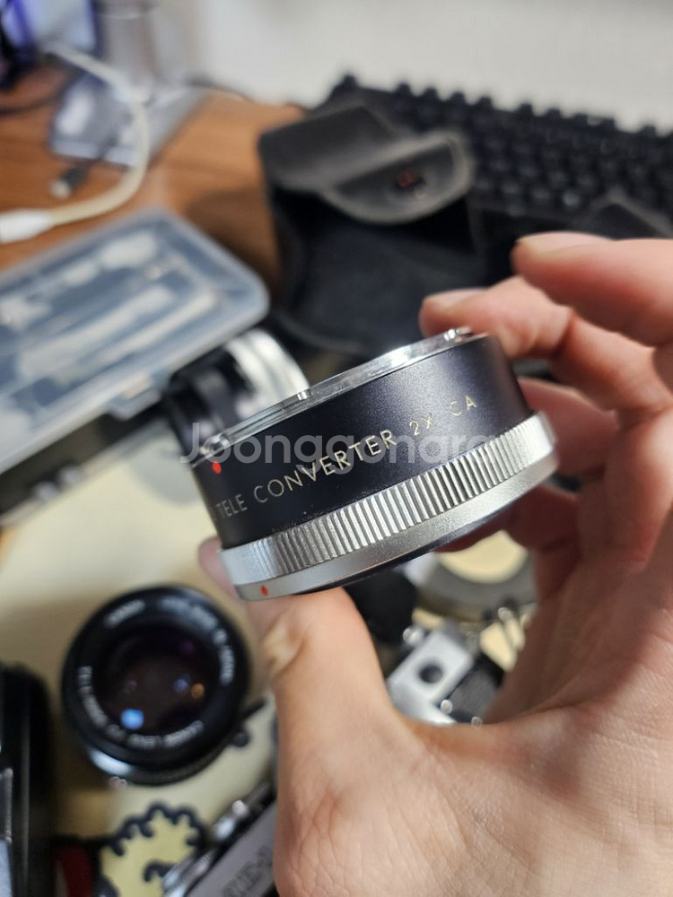 AE-1 카메라, 50mm 1.4 렌즈, 28mm 2.--4