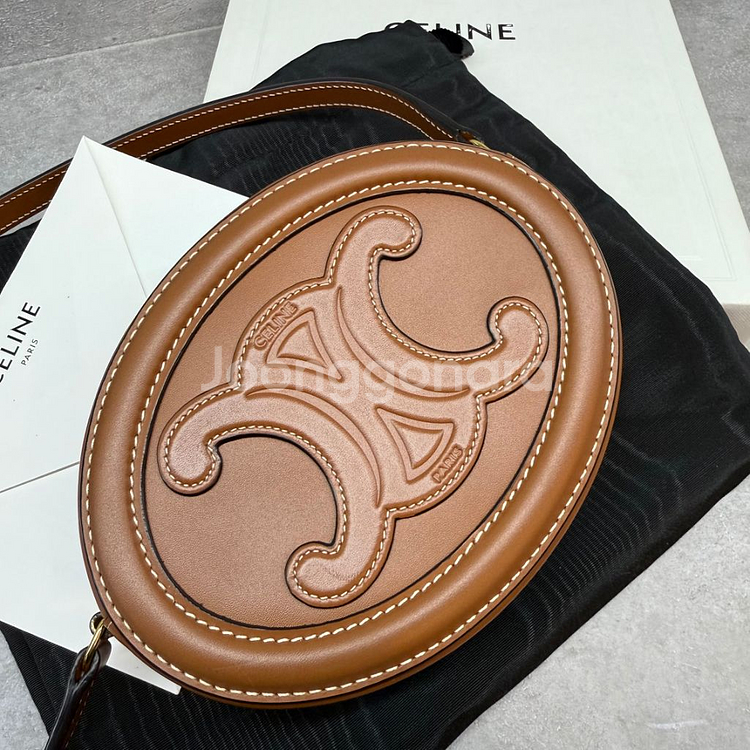 셀린느 퀴르 오벌 펄스 미니 크로스백--1