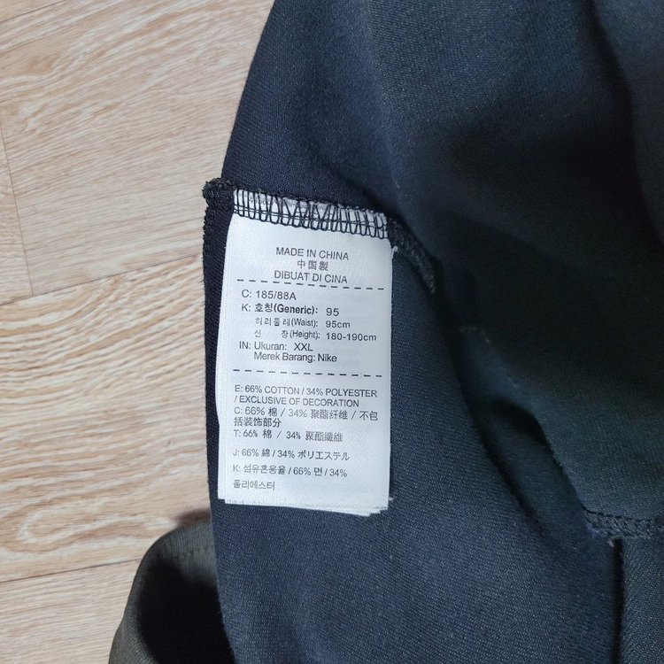 나이키 테크팩 바지 카키 이미지