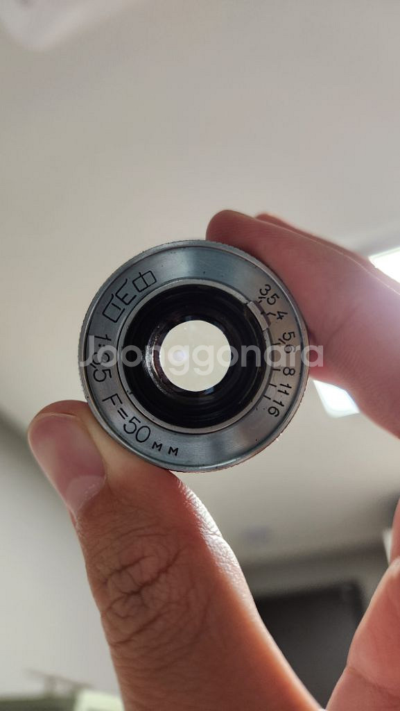 인더스타 10 렌즈 + m마운트 어댑터 팝니다.--0