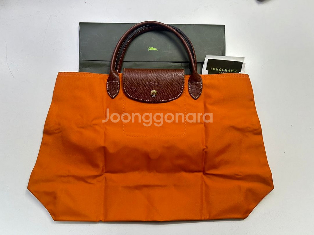 롱샴 르 플리아쥬 파우치 위드 핸들 오렌지--1