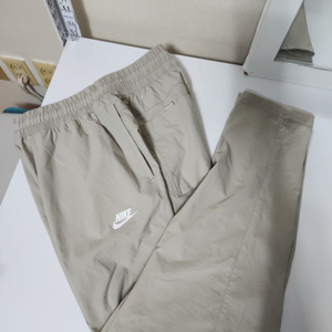 나이키 스포츠웨어 사이드 지퍼 포켓 우븐팬츠(L)