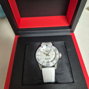 티쏘 씨스타 1000 쿼츠 36mm 자개 다이아 화이트