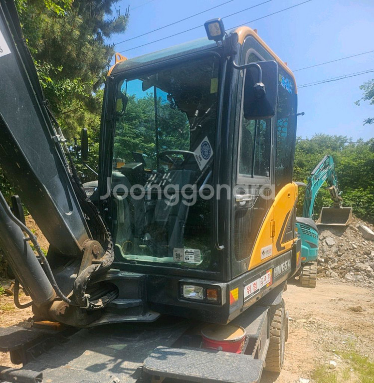 현대 HW65 23년식 집게 더블 타이어 굴삭기--1