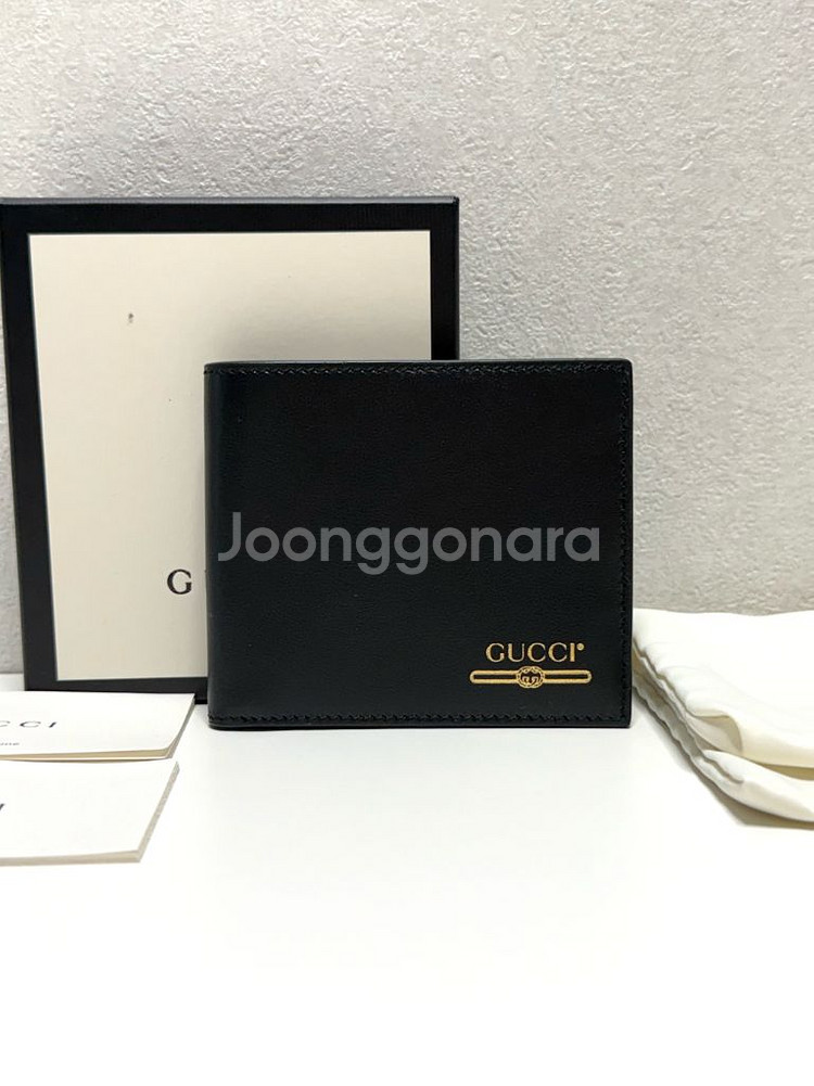 (새상품)구찌 골드 메탈릭 로고 반지갑--0