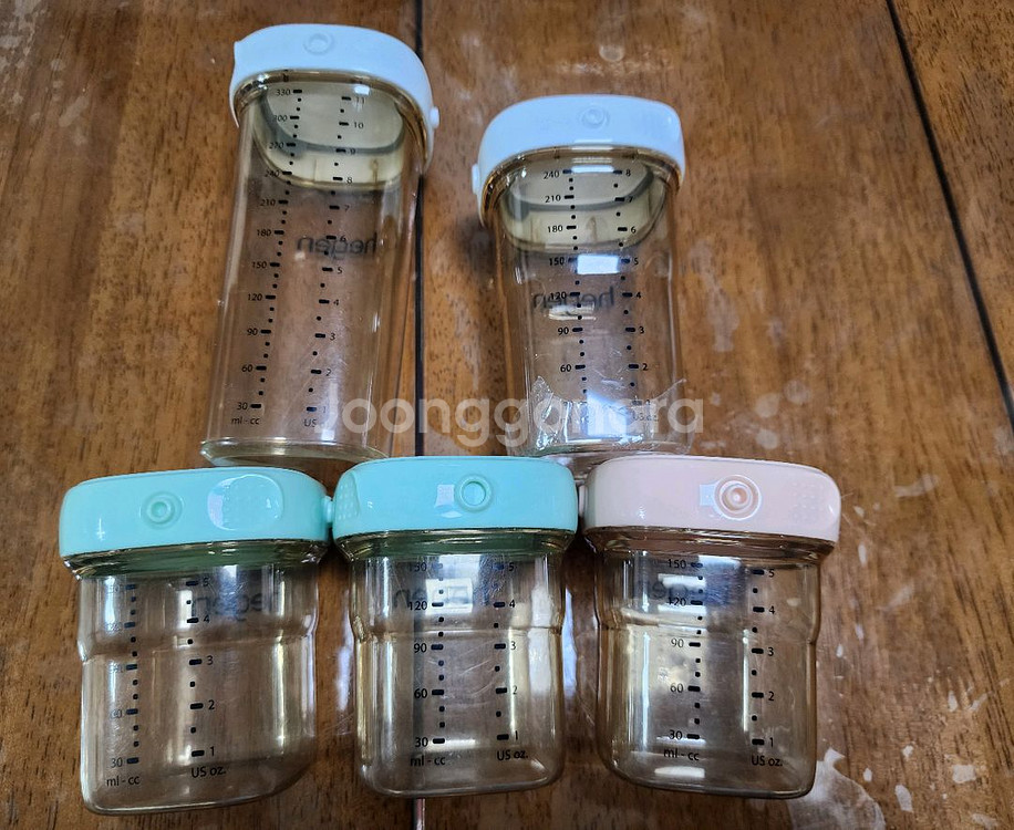 헤겐 이유식 보관용기& 젖병뚜껑 팝니다.--0