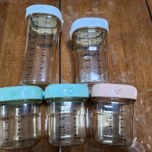 헤겐 이유식 보관용기& 젖병뚜껑 팝니다.