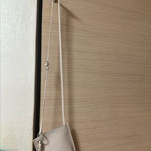 제이에스티나 크로스백