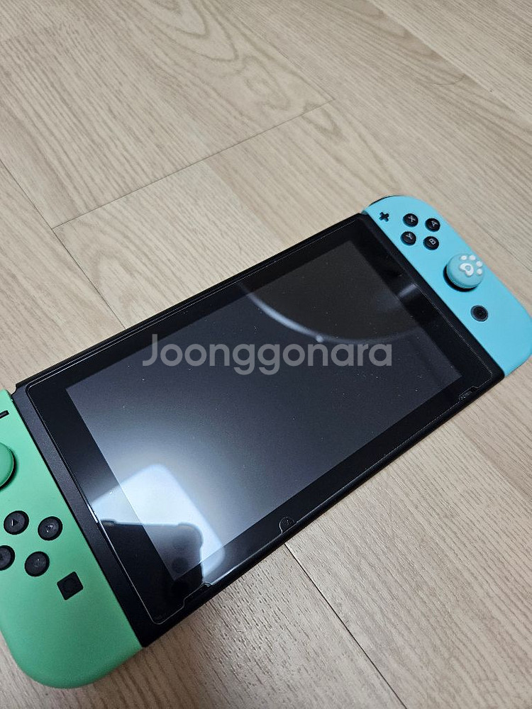 닌텐도 스위치 동물의 숲 에디션 배터리 개선판 팔아요.--1
