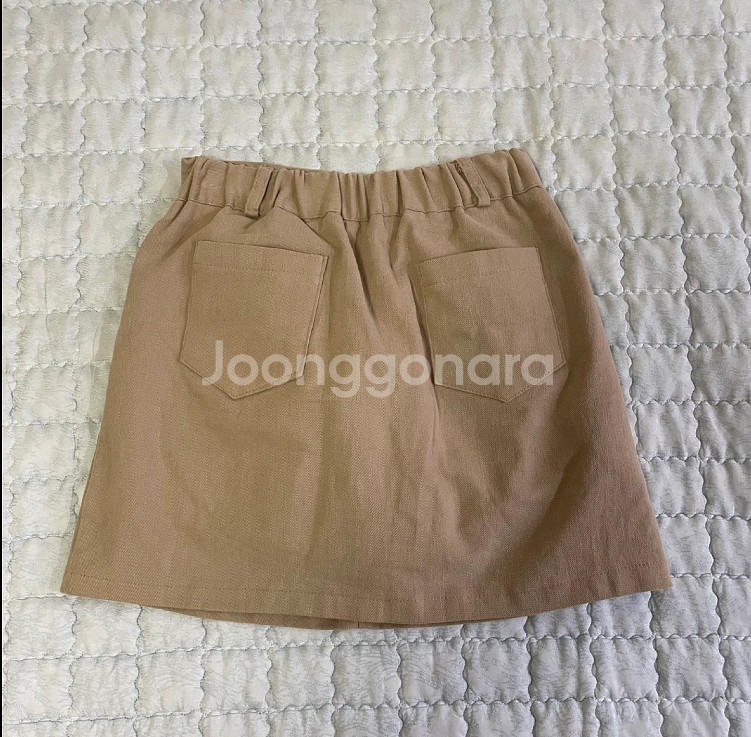 뒷밴딩 베이지 A라인 미니 스커트--1