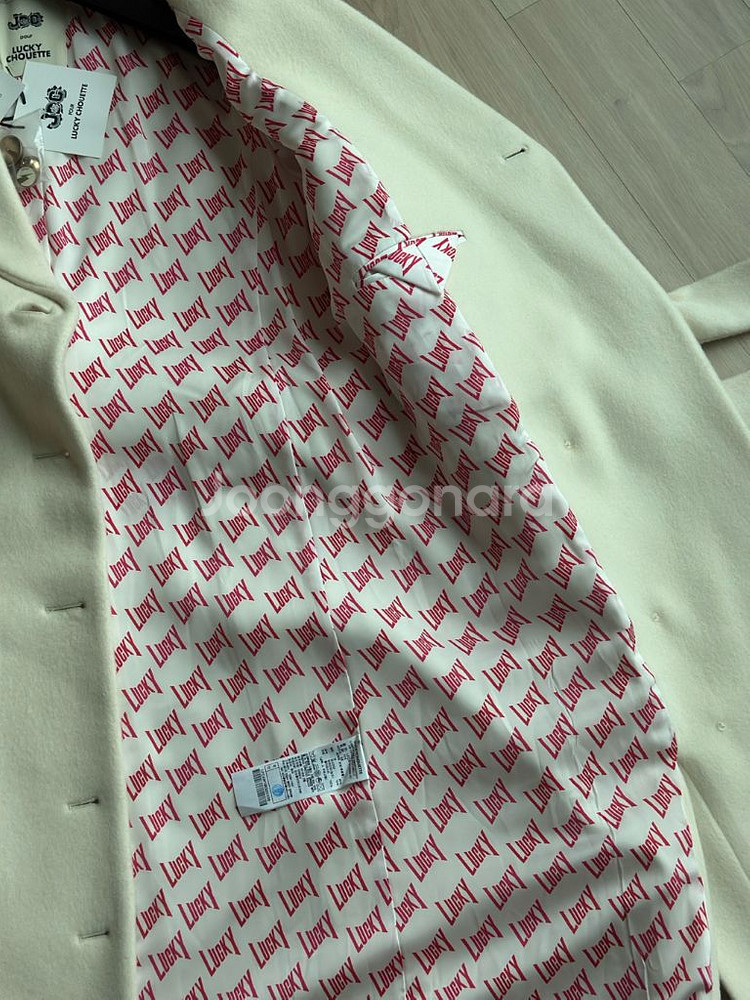 럭키슈에트 아이보리 코트 36--6