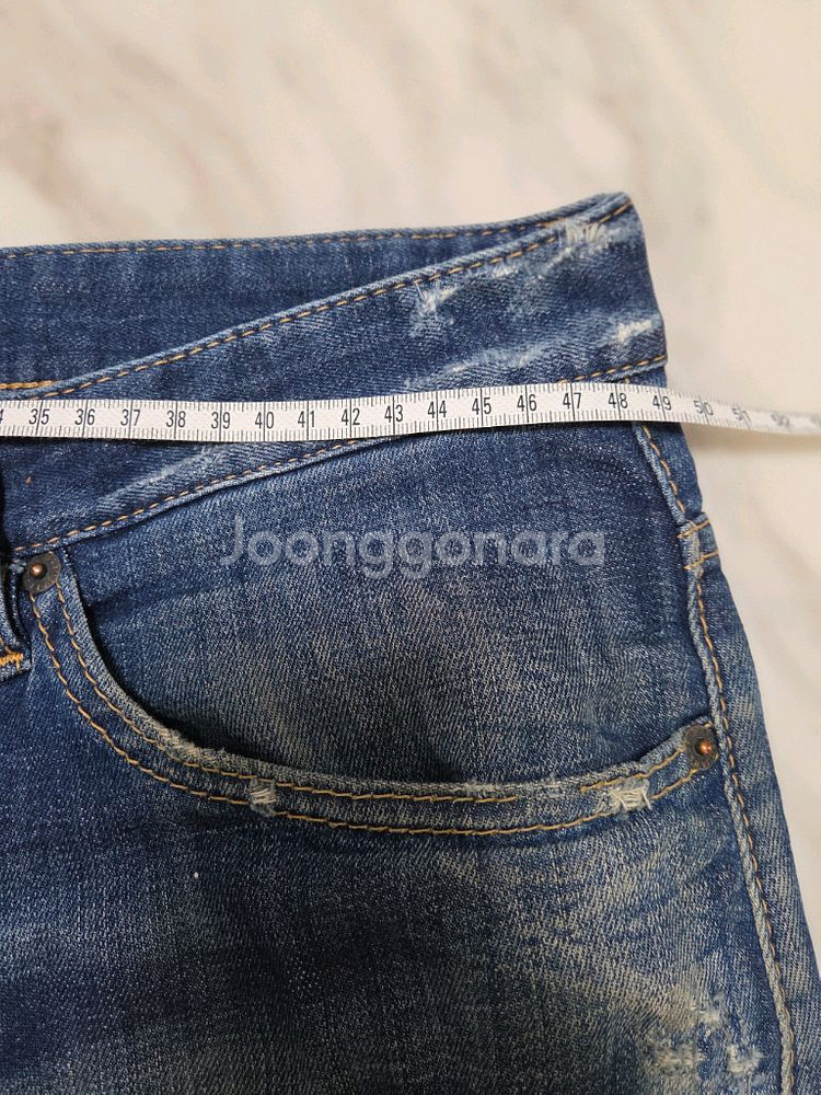 디스퀘어드 가죽패치 데님팬츠--8