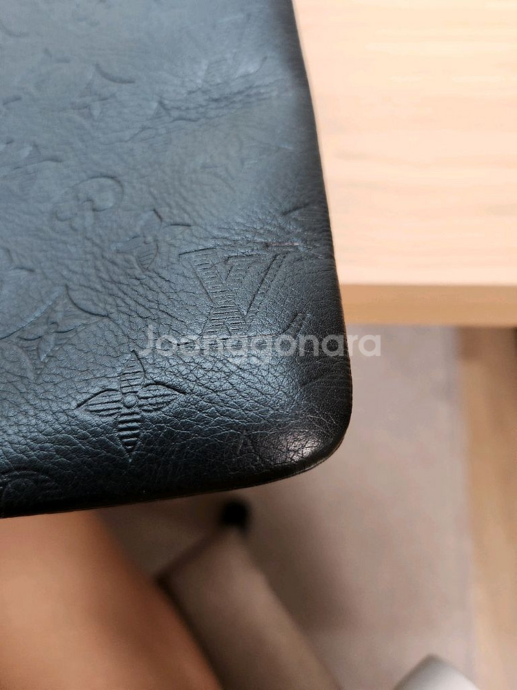 루이비통 디스커버리 포쉐트 클러치 M62903--9