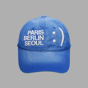 더뮤지엄비지터 스마일 로고 워시드 볼캡 블루