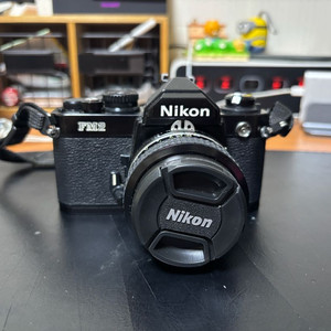 니콘 FM2 바디 + 50mm f1.4 단렌즈 팝니다.