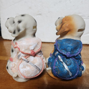 가방을 멘 강아지 4마리