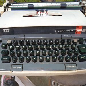 스미스 코로나 코로넷 슈퍼 12 전기 휴대용 타자기
