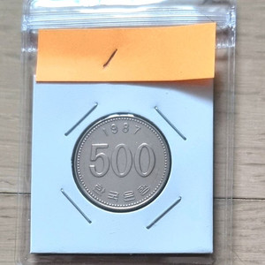 1987년500원삐뚤이회전에러동전을판매합니다