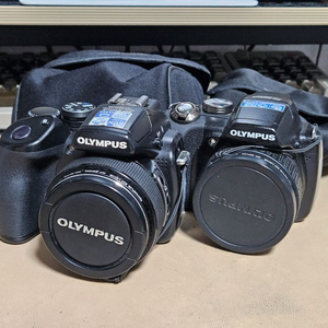 올림푸스 SP-565UZ + SP-570UZ