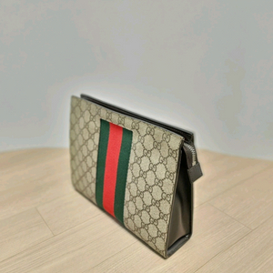 구찌 GUCCI GG 수프림 웹 파우치 / 779882