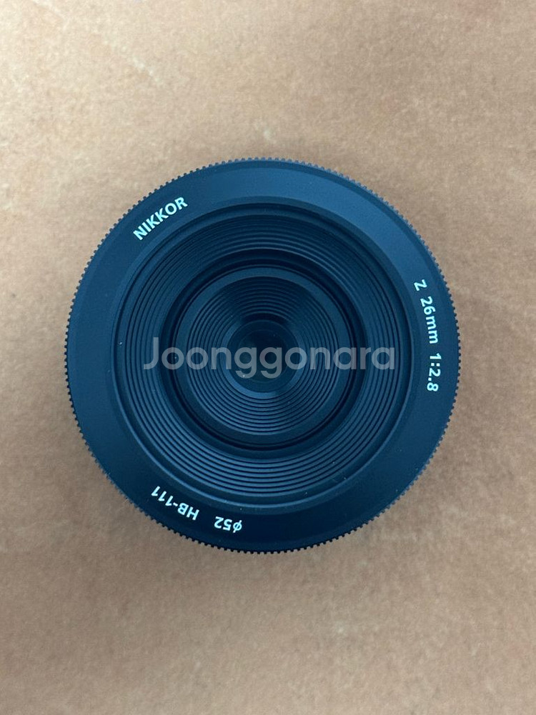 니콘 z 26mm f2.8 s렌즈 팝니다.--1