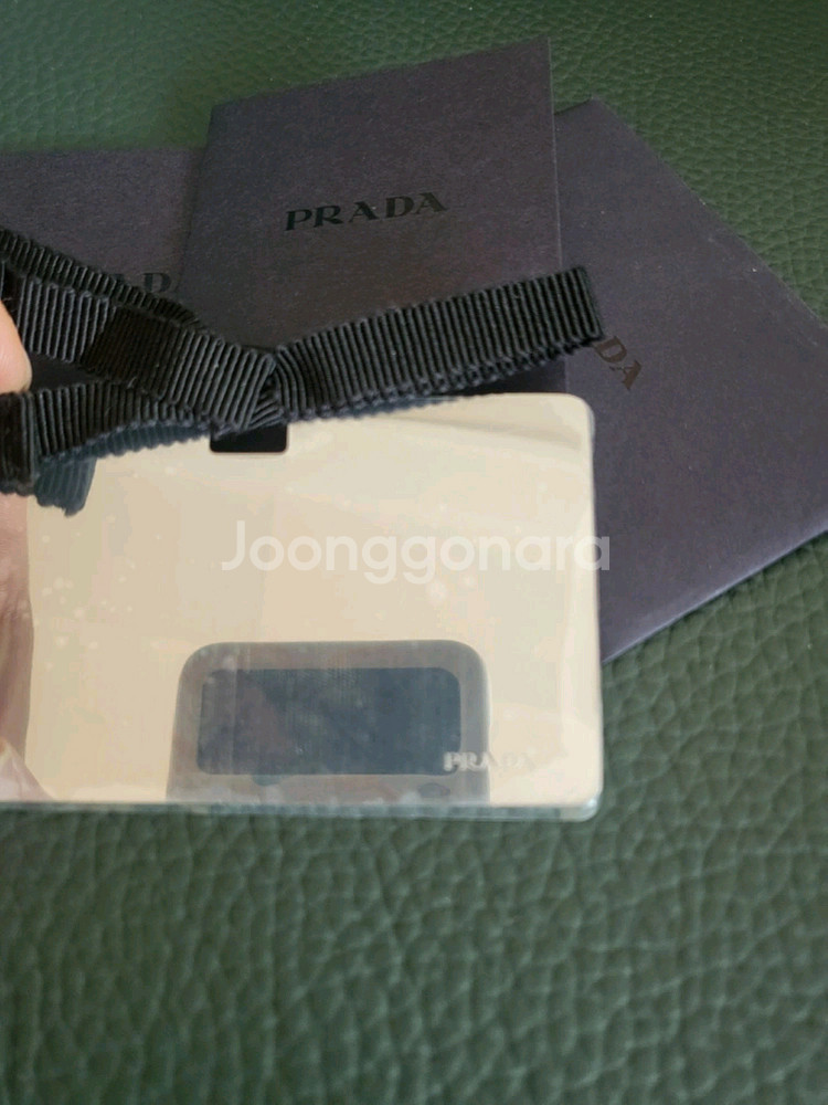 프라다 사피아노엔벨로프 크로스백 팝니다.--9